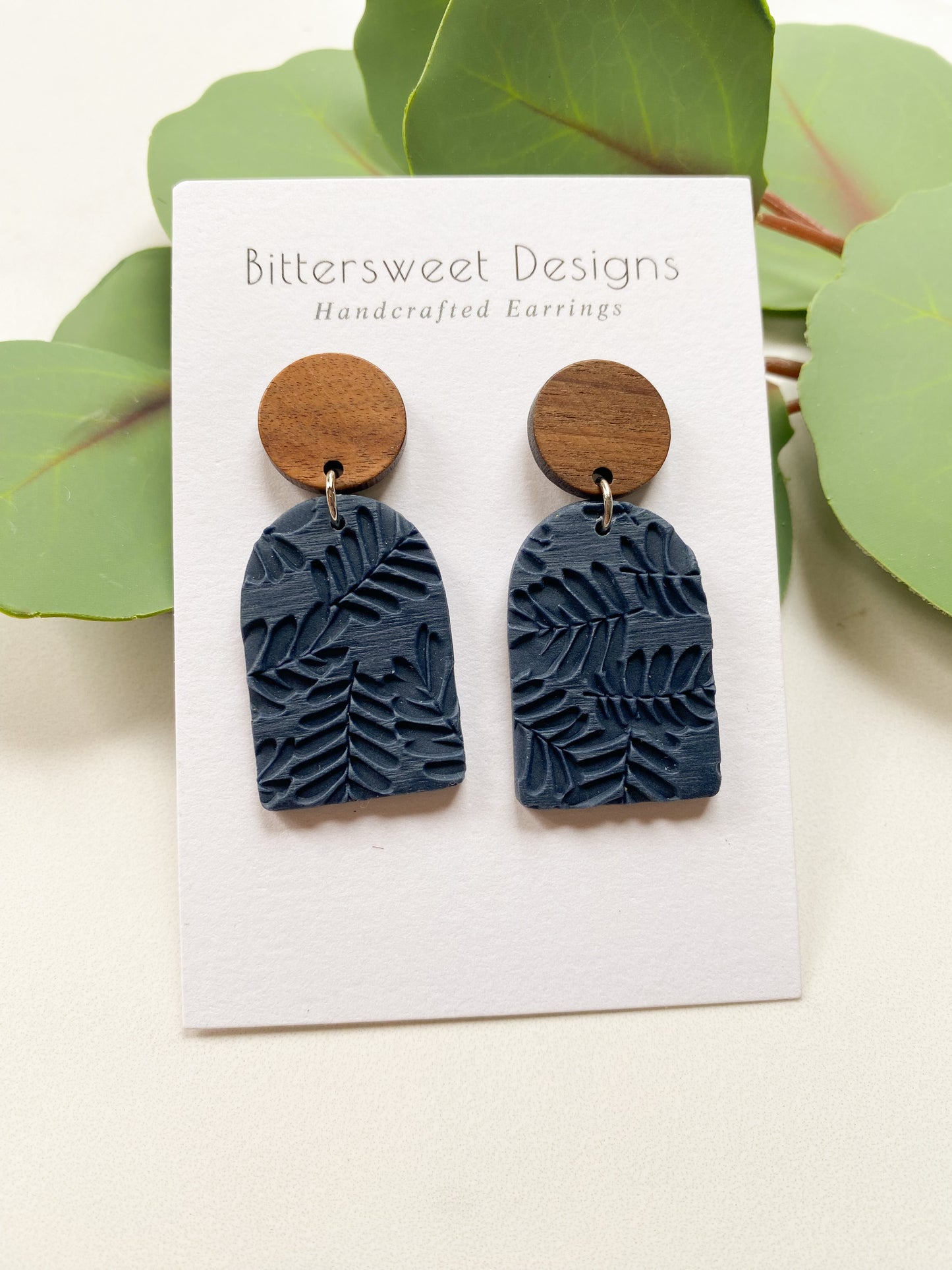 Navy Blue Fern Closed Window