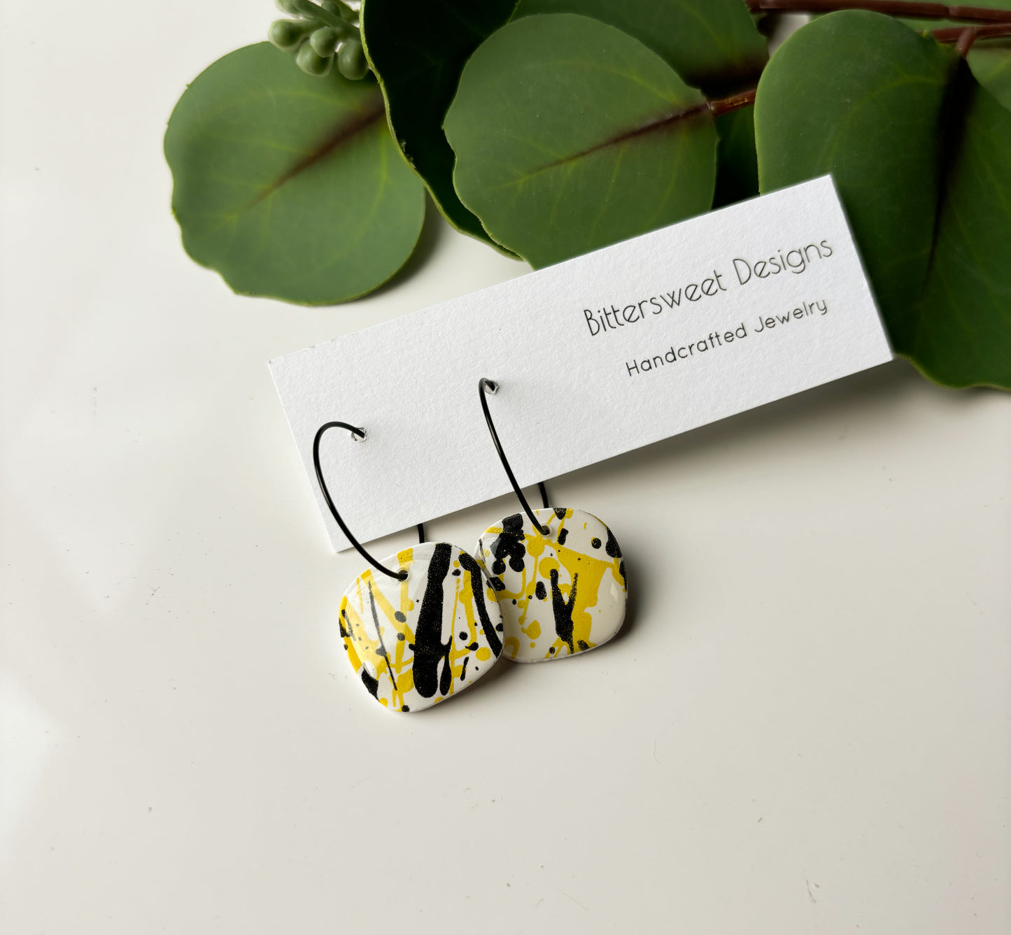 Black and Yellow Splatter Print: Mini Hoops