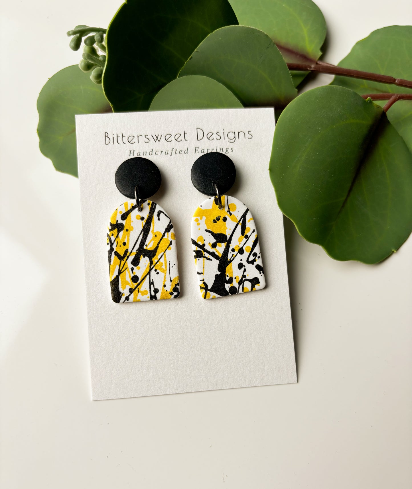 Black and Yellow Splatter Print: Closed Window